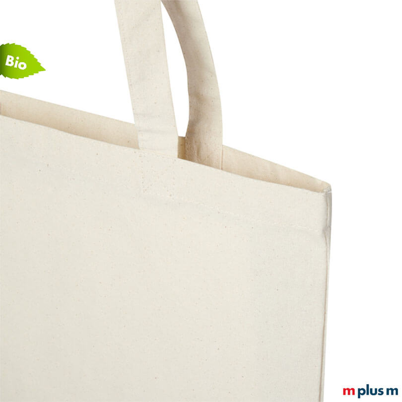 Baumwolltasche aus Bio-Baumwolle in Natur mit langen Henkeln und seitlicher Detailansicht